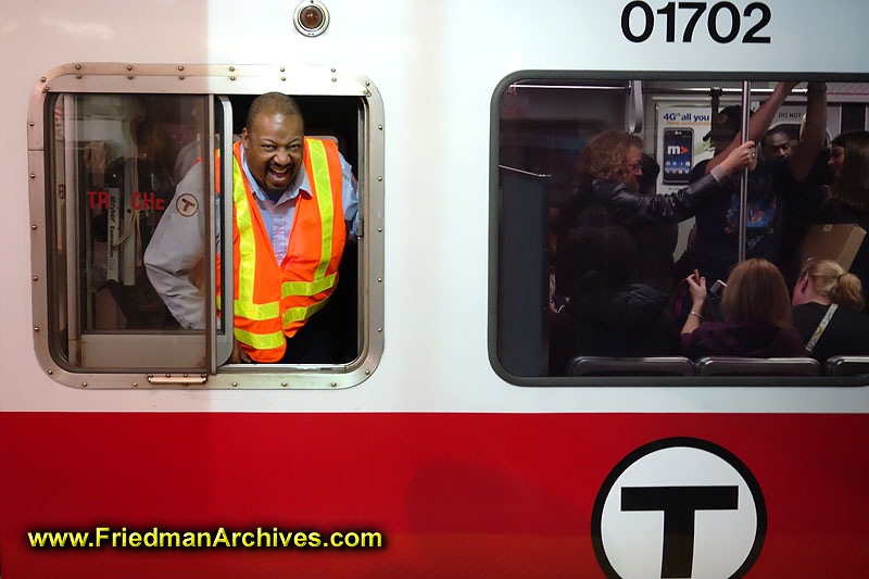 transportation,subway,tube,rail,train,conductor,laughing,life,environmental portrait,portrait,city employee,city,Boston,underground,